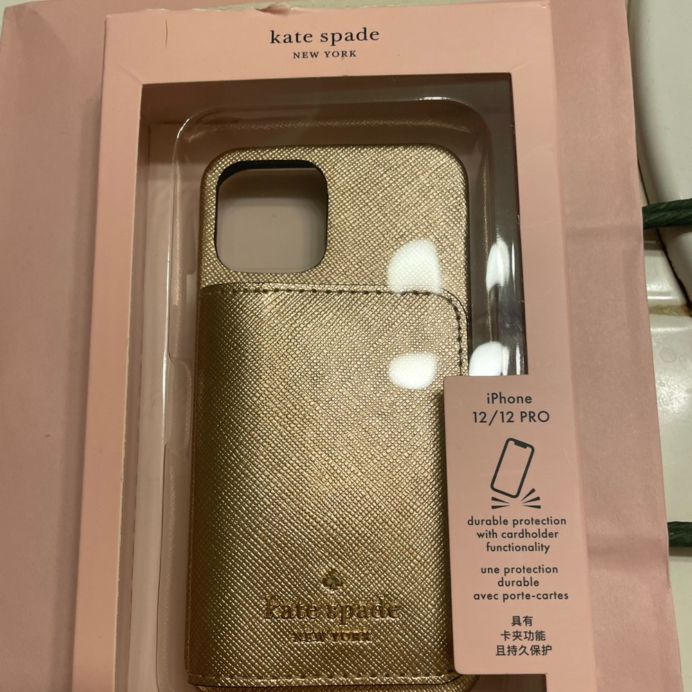 Kate spade phone case with attached wallet.